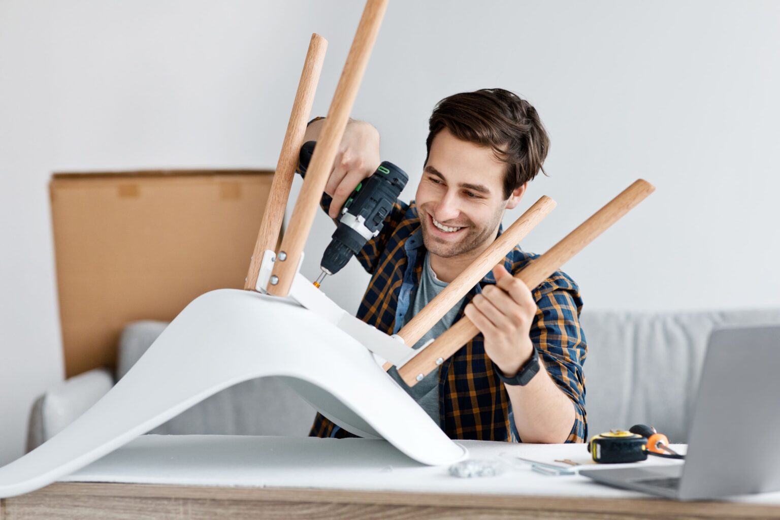 man-fixing-furniture-repairing-wooden-chair-usin-2025-04-02-06-11-43-utc